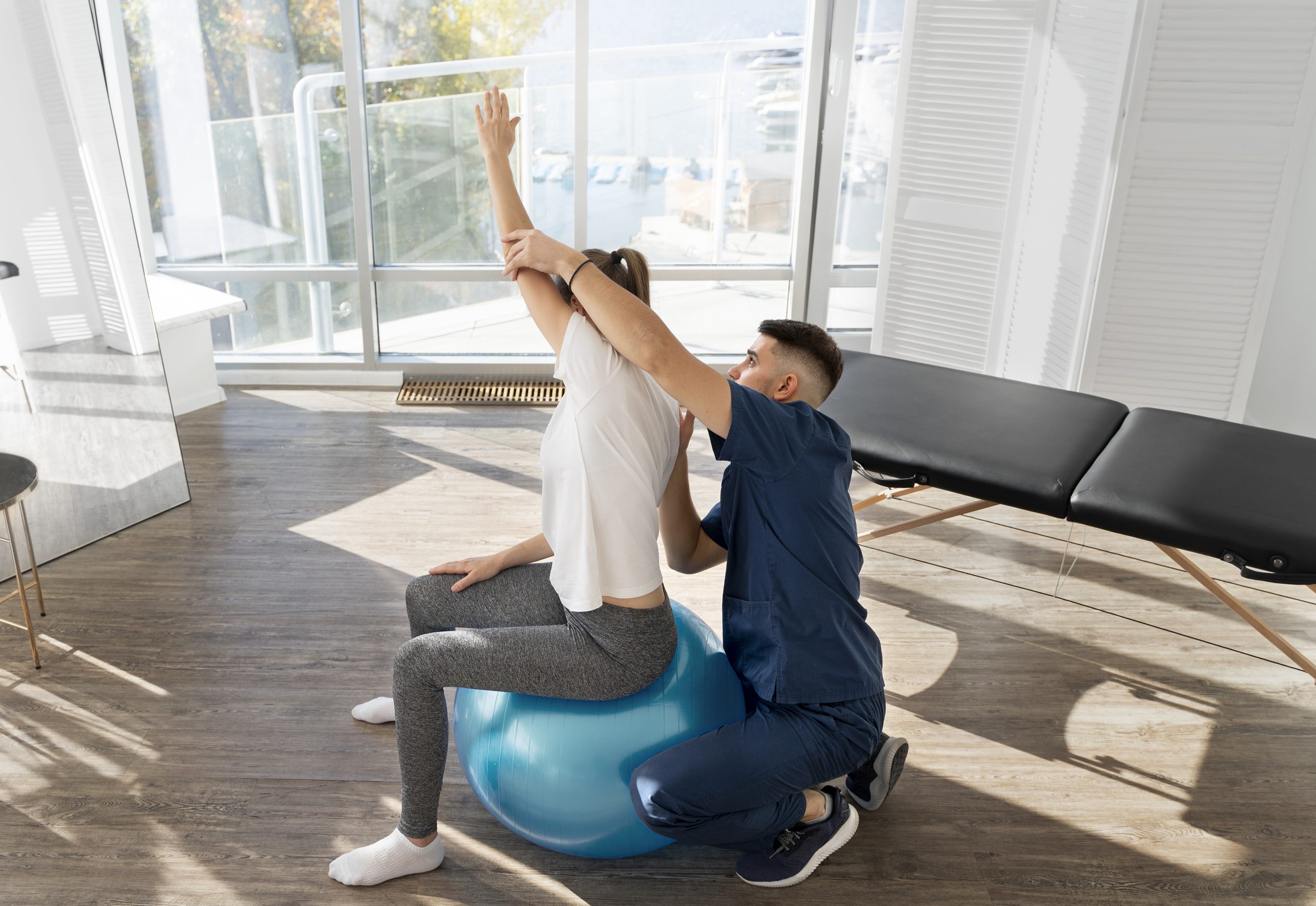 full-shot-woman-exercising-gym-ball